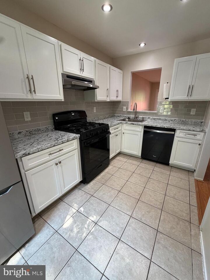 Property Photo: 14246 Long Green Drive MD 20906