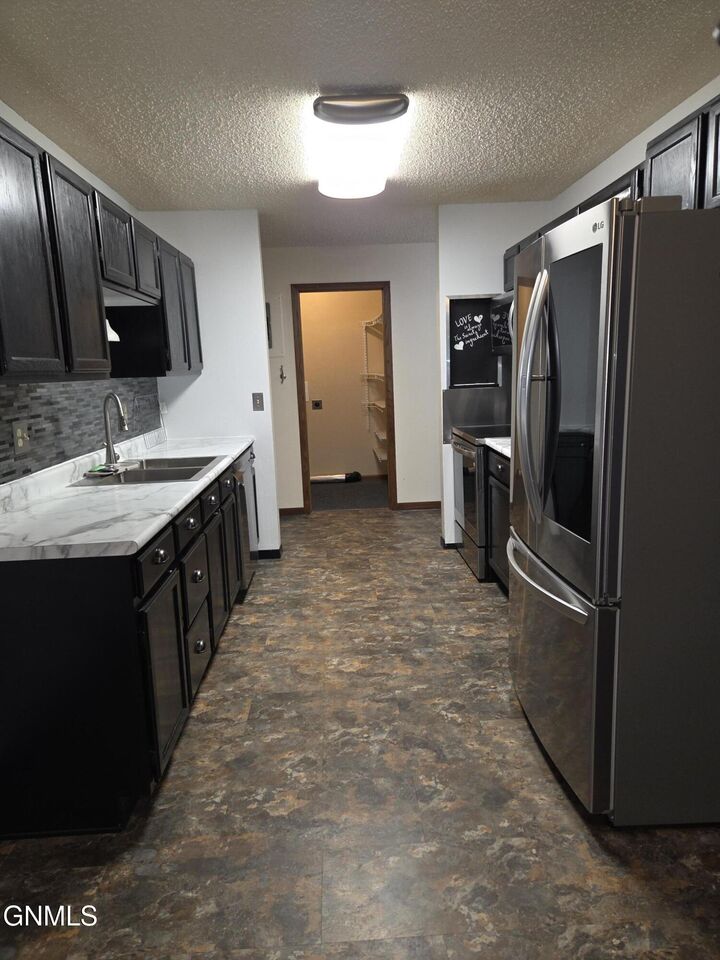 Property Photo: 100 7th Street NW 311 ND 58523