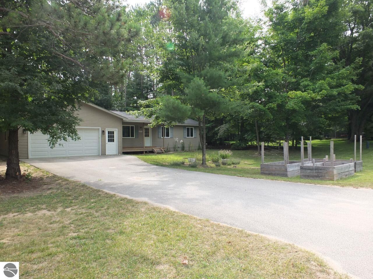 Property Photo:  6211 Bellows Lake Road  MI 49650 