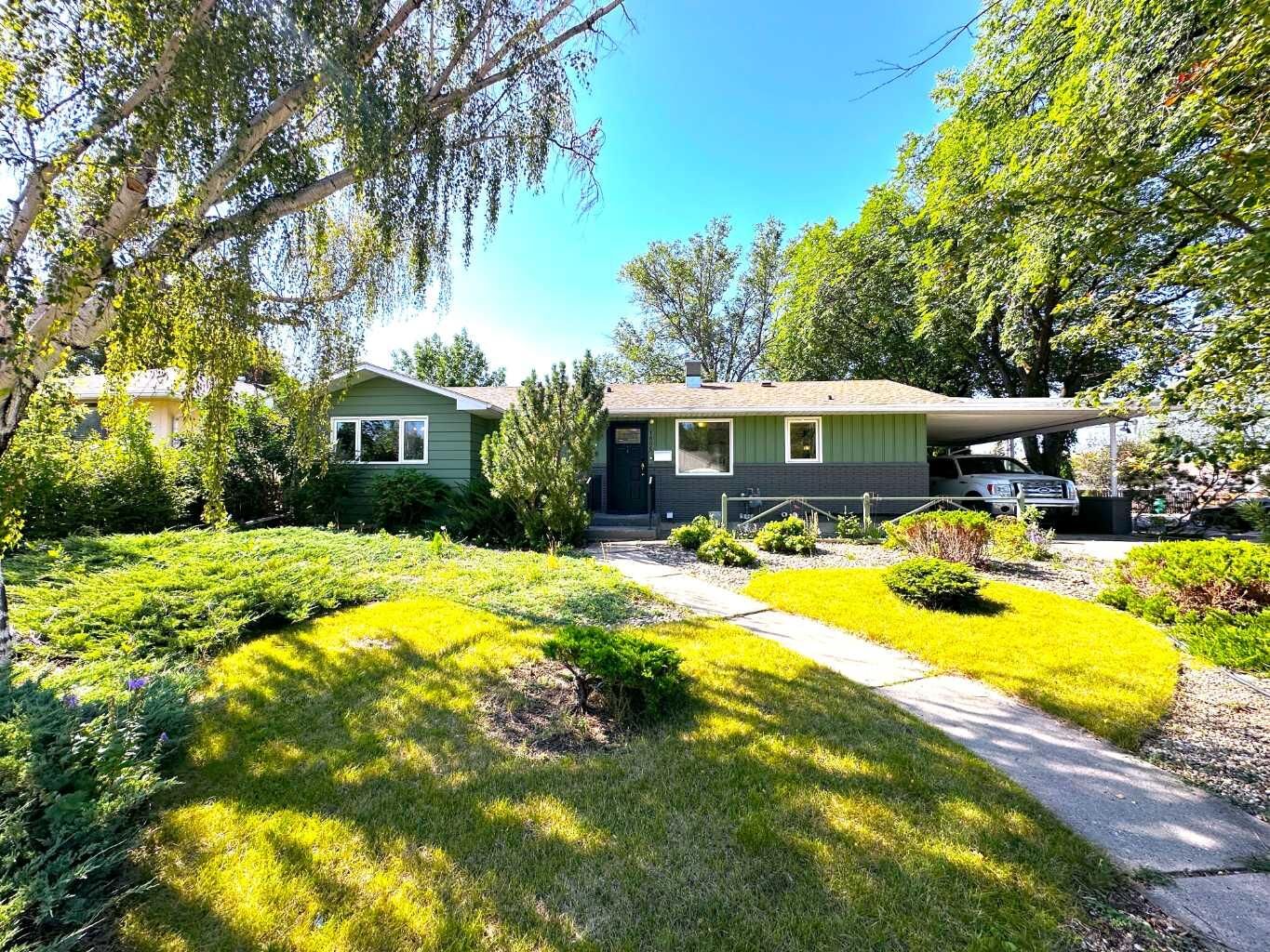 Property Photo: 1806 13 Avenue S AB T1K 0S2