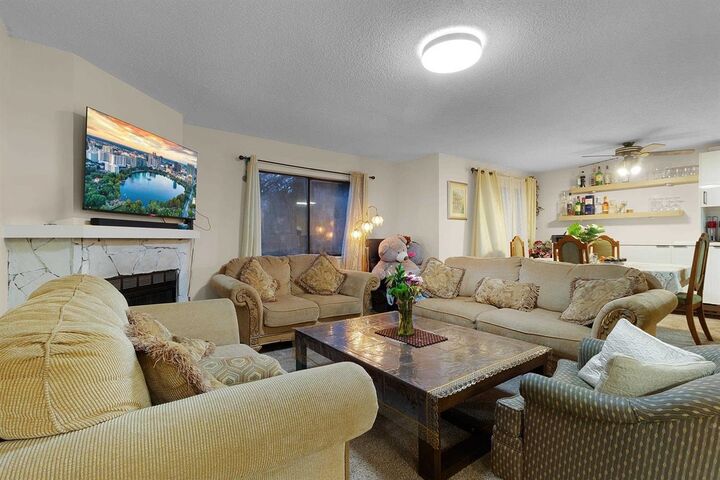 Property Photo:  7064 133B Street 202  BC V3W 7Z2 