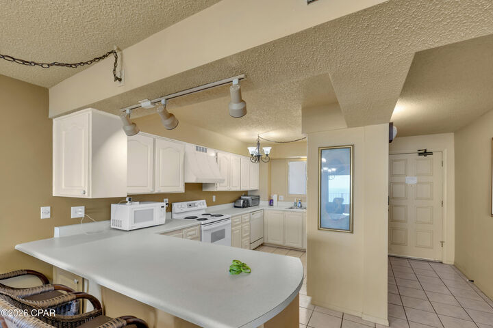 Property Photo:  5801 Thomas Drive 1305  FL 32408 