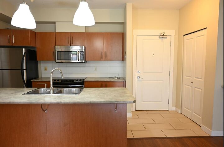 Property Photo:  33545 Rainbow Avenue 202  BC V2S 0B9 