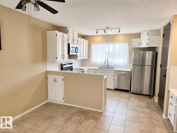 Property Photo: 7812 144 Av NW AB T5C 2S1