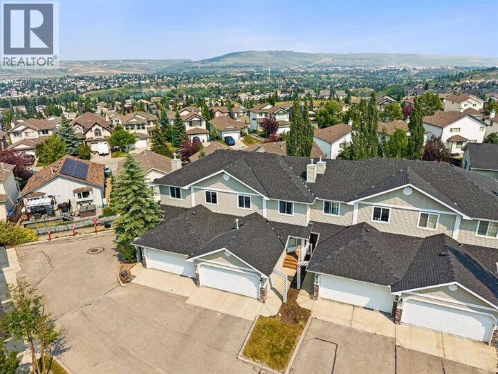 Property Photo:  117 Bow Ridge Drive  AB T4C 2G9 