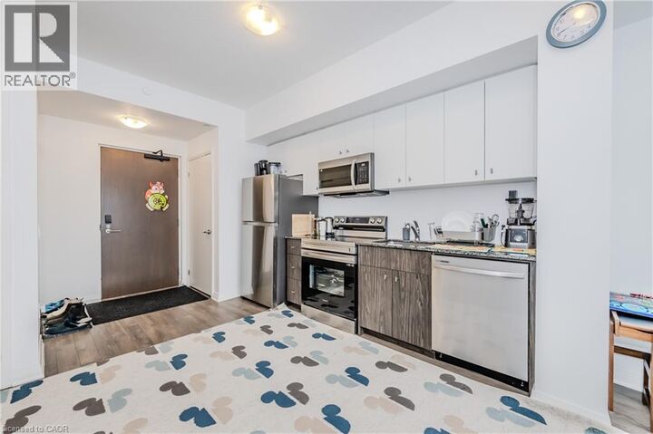 Property Photo:  101 Golden Eagle Road 411  ON N2V 1C3 