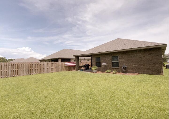 Property Photo:  726 Cocobolo Drive  FL 32459 