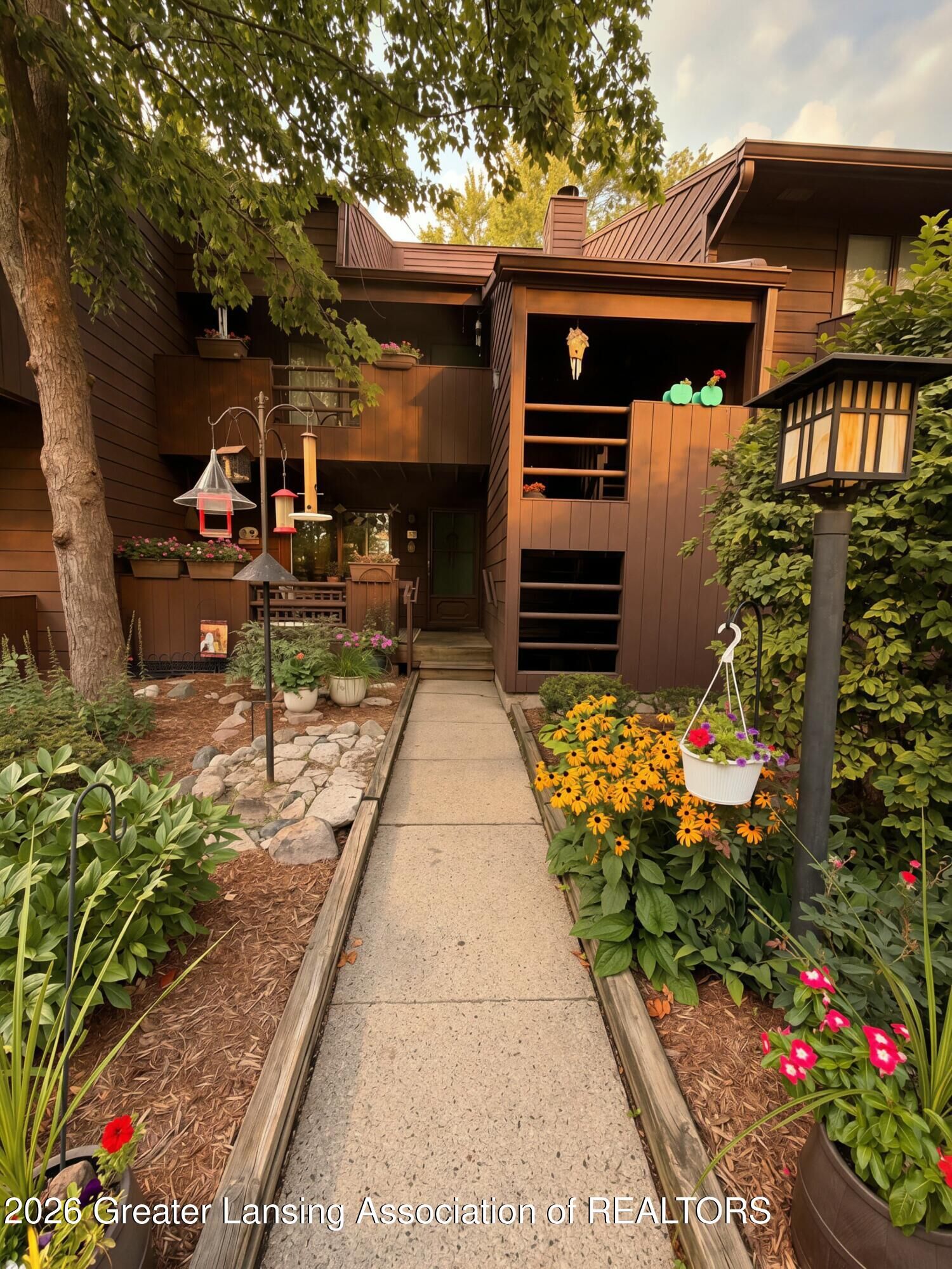 Property Photo:  205 E Jolly Road  MI 48910 