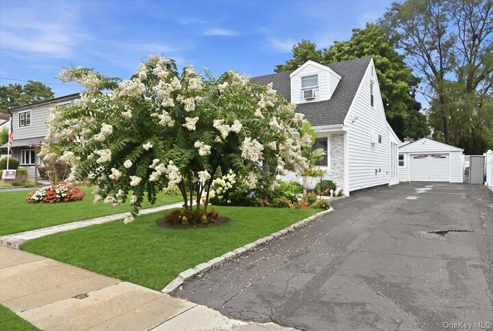 Property Photo: 913 Merillon Avenue NY 11590