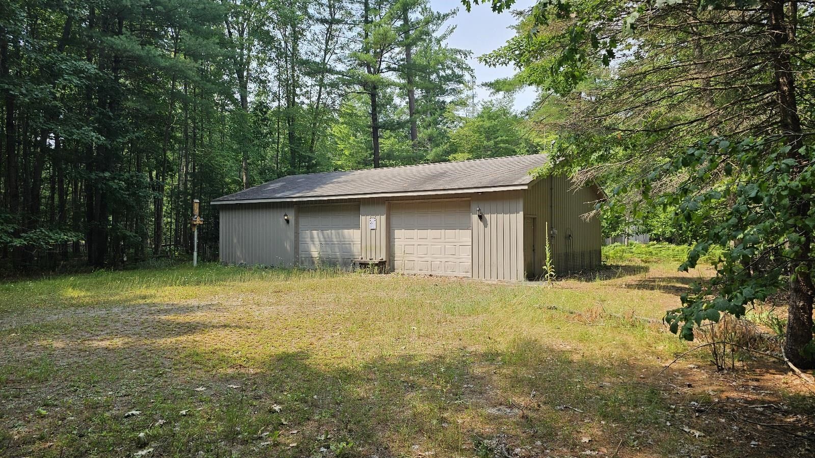 Property Photo:  98 West River Drive  MI 48624 