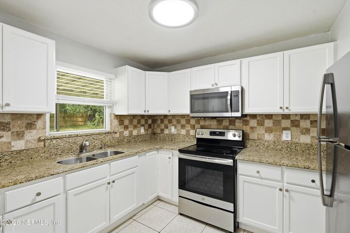 Property Photo: 1932 Kusaie Drive FL 32246