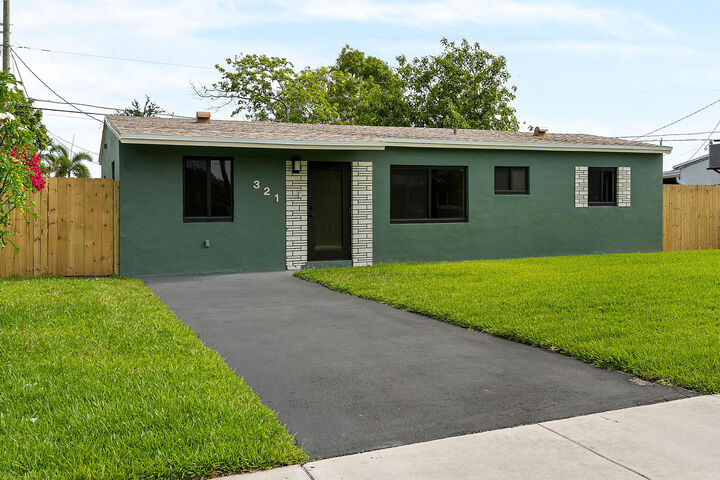 Property Photo: 321 NE 59th Street FL 33334
