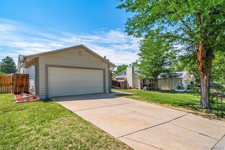 Property Photo: 3865 S Nucla Street CO 80013