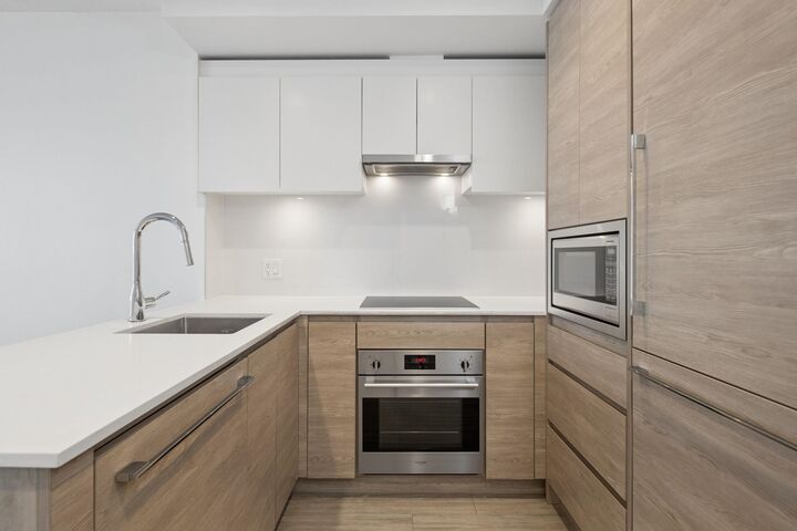 Property Photo:  13615 Fraser Highway 1805  BC V3T 0P7 