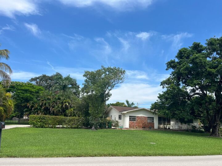 Property Photo: 1200 NW 118th Ave FL 33323