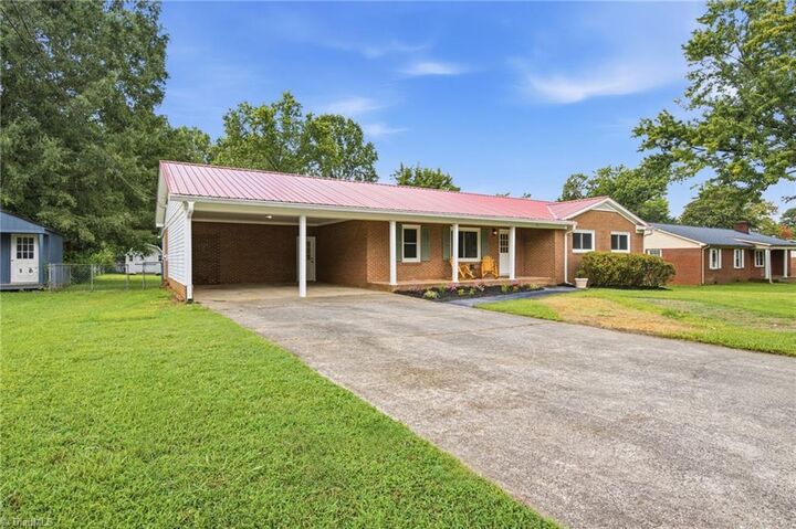 Property Photo:  211 Maxwell Drive  NC 27295 