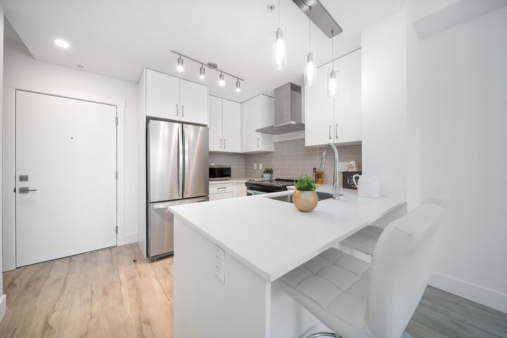 Property Photo: 6338 King George Boulevard 116 BC V3X 0L4