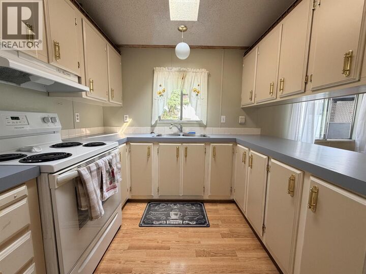 Property Photo:  2155 Commodore Crescent 10  BC V2G 5E1 