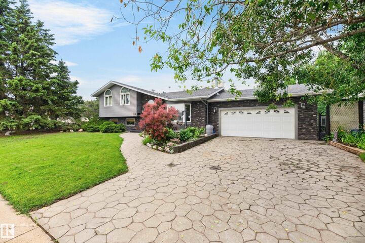 Property Photo: 13204 47 Street NW AB T5A 3P6