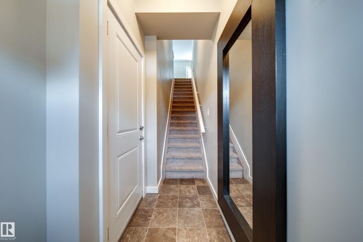 Property Photo: 2803 James Mowatt Trail SW 1 AB T6W 2P5