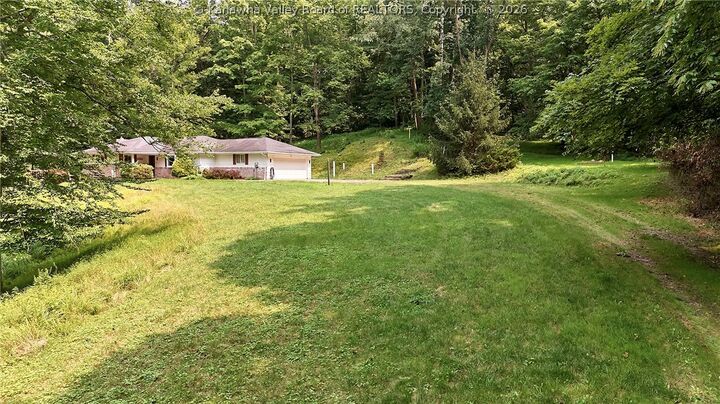 Property Photo:  1011 Lynn Oaks Drive  WV 25313 