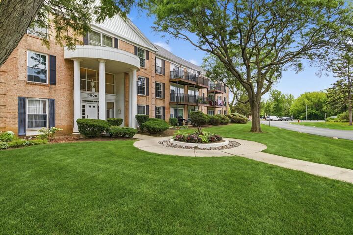 Property Photo: 5300 Carriage Way Drive 107 IL 60008