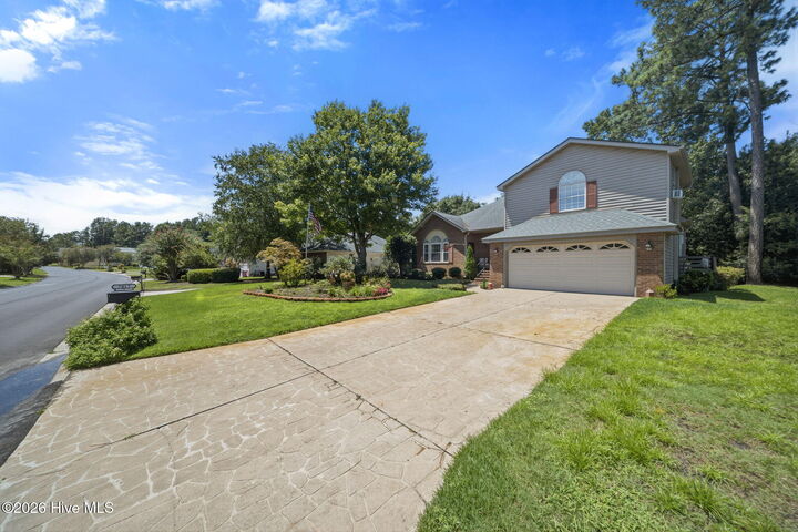 Property Photo: 7017 Brittany Lakes Drive NC 28411