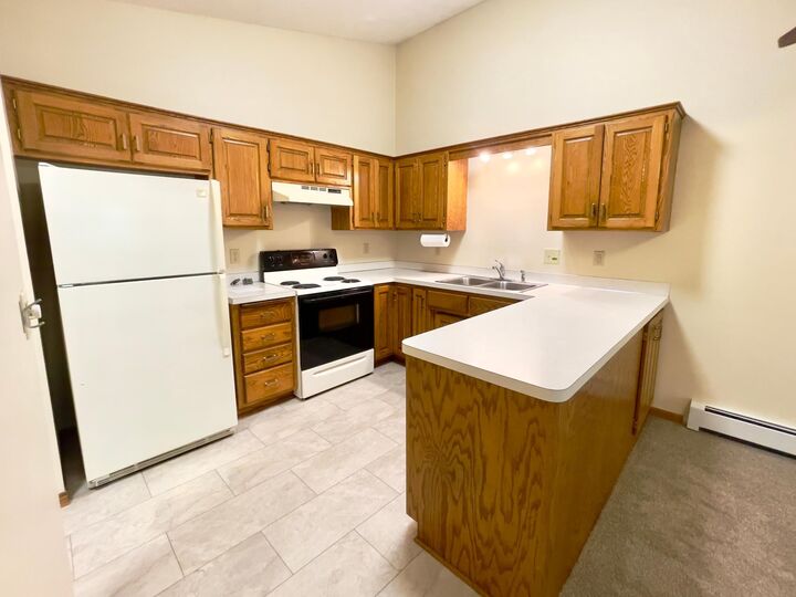 Property Photo: 2000 108th Lane NW 203 MN 55433