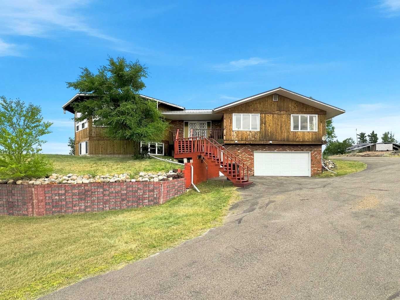 Property Photo: 210 1 Street S AB T0J 0Y9