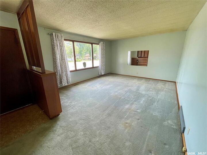 Property Photo: 206 McIntosh Street N SK S4R 4Z9