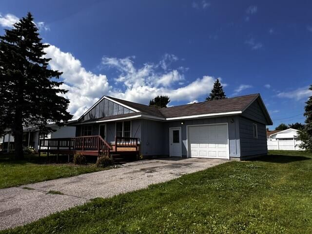Property Photo:  116 Byron Street  MI 49721 