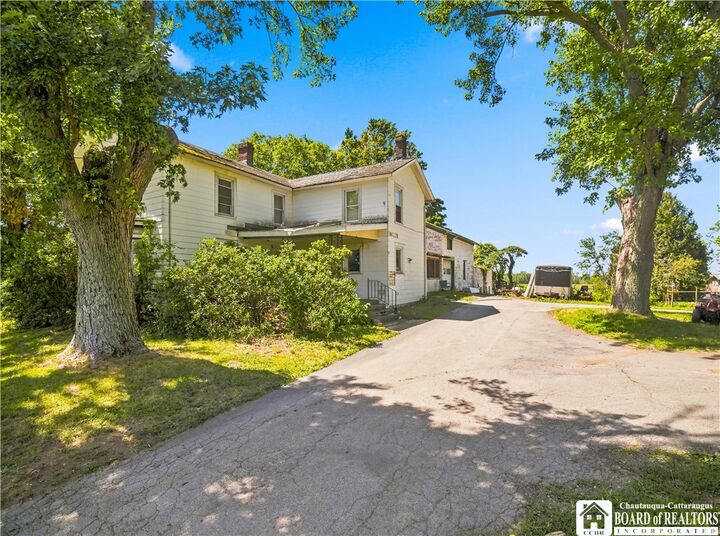 Property Photo:  7474 & 7472 E Main Road  NY 14787 