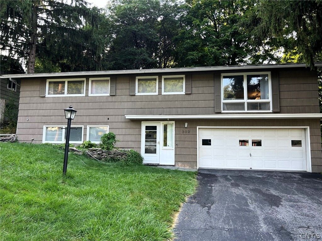 Property Photo: 302 Oakridge Drive NY 13031