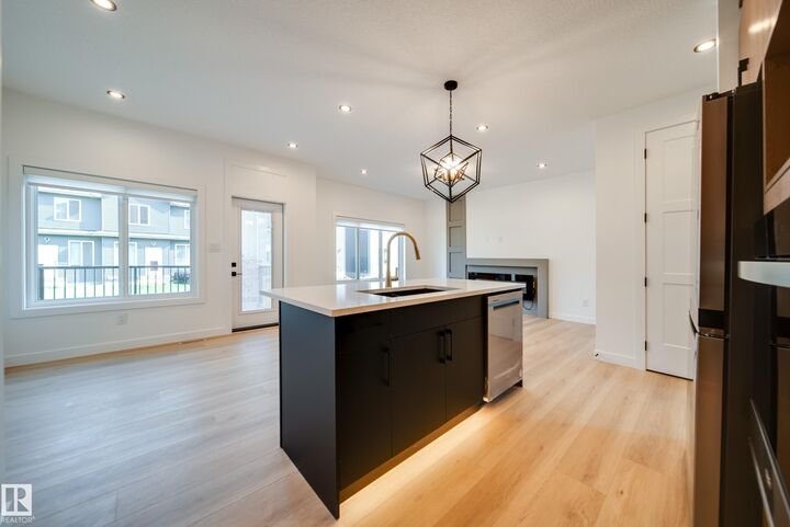 Property Photo: 10 Blackbird Bend AB T8L 0G6