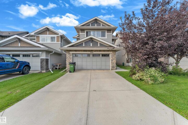 Property Photo: 6945 Evans Wynd NW AB T6M 0P9