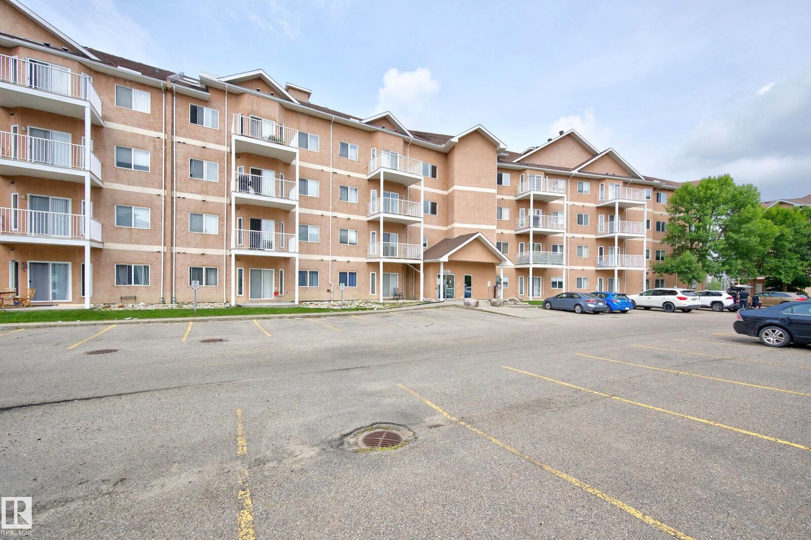 Property Photo: 4316 139 Avenue NW 211 AB T5Y 0L1
