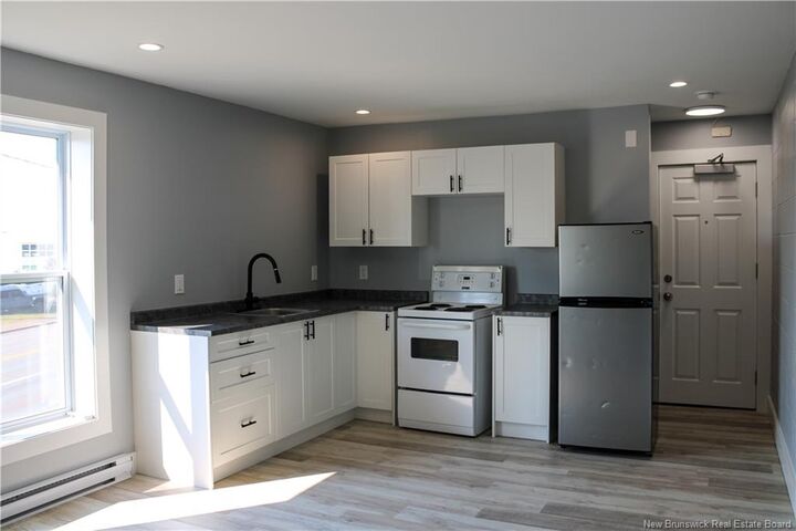 Property Photo:  1751 Main Street 307  NB E1E 1H2 