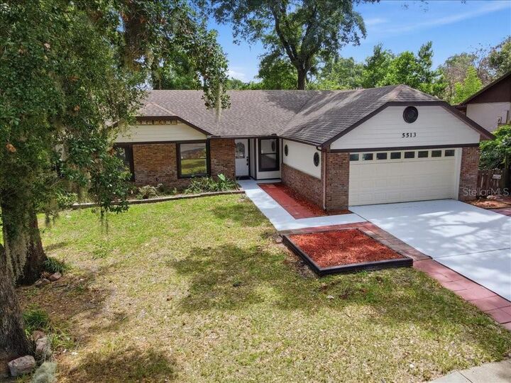Property Photo: 5513 Caurus Court FL 32808