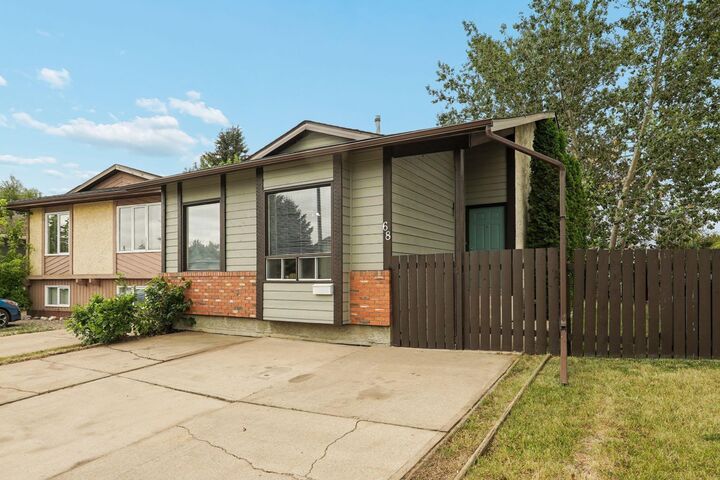 Property Photo: 68 Dakota Road W AB T1K 5L5