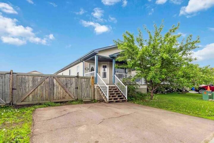 Property Photo: 221 Ash Way AB T9K 0G2