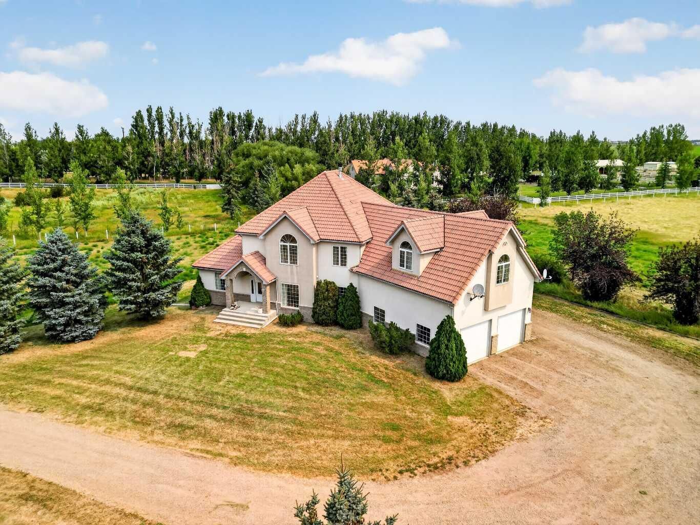 Property Photo: 84051 Range Road 210A AB T1J 5P9