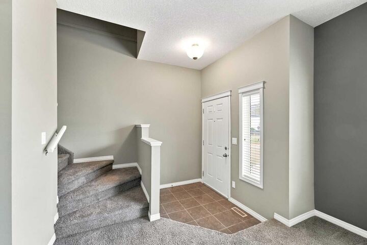 Property Photo: 50 Lucky Place 115 AB T4S 0E3