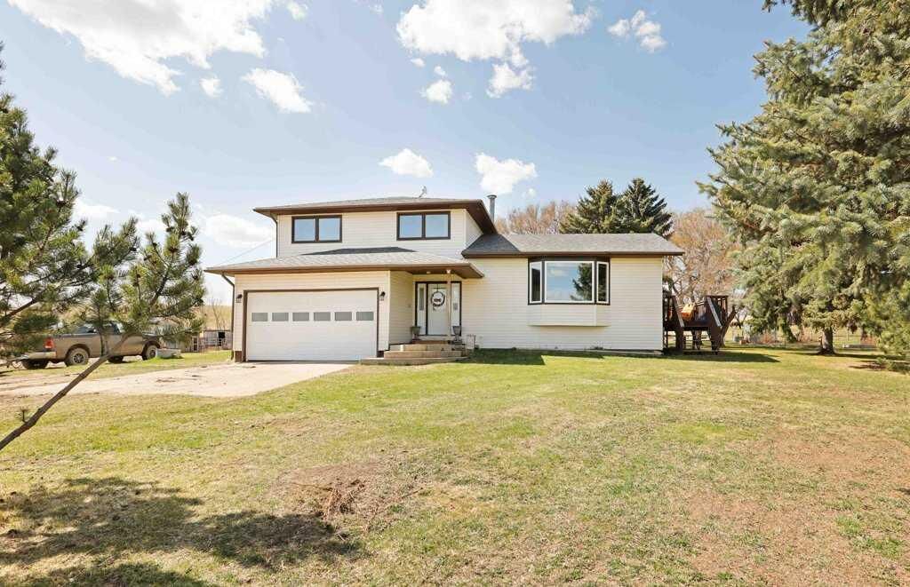 Property Photo: #26 142041 Tr 200 AB T1R 1B9