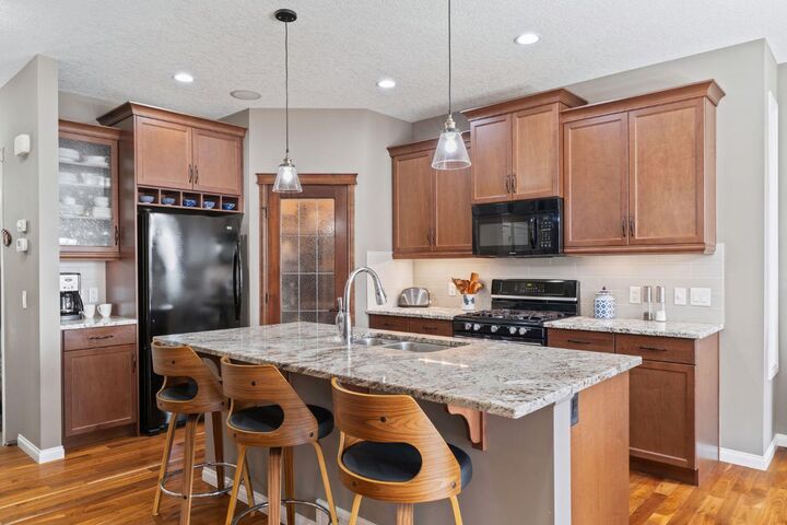 Property Photo:  204 Sunset Square  AB T4C 0H3 