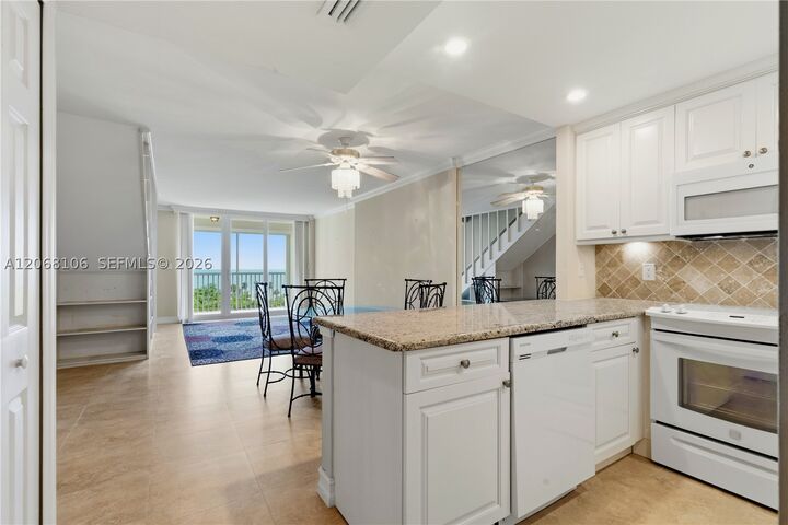 Property Photo: 5 Bluebill 702 + 802 FL 34108