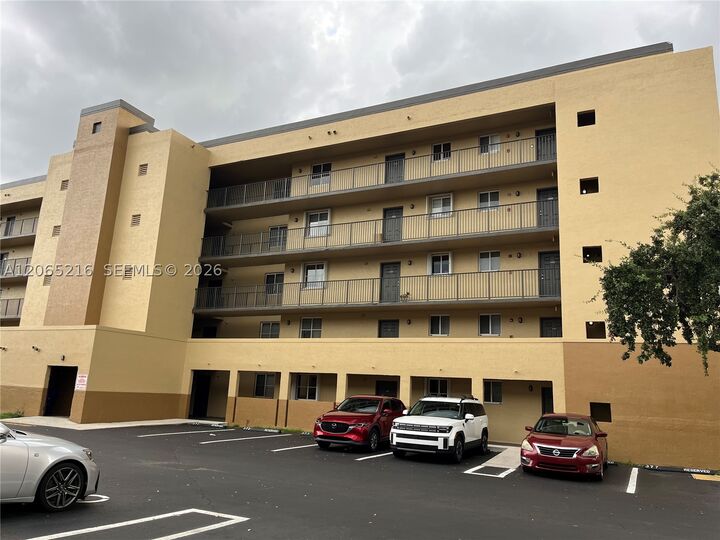 Property Photo:  14930 SW 82nd Ter 16-205  FL 33193 