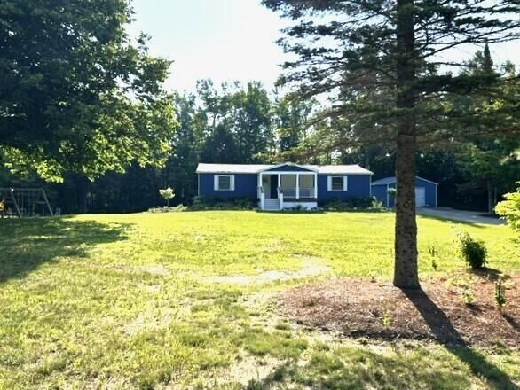 Property Photo:  8588 Littlefield Lane  MI 49706 