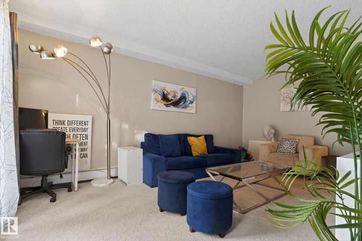 Property Photo:  5730 Riverbend Road NW 120  AB T6H 4T4 