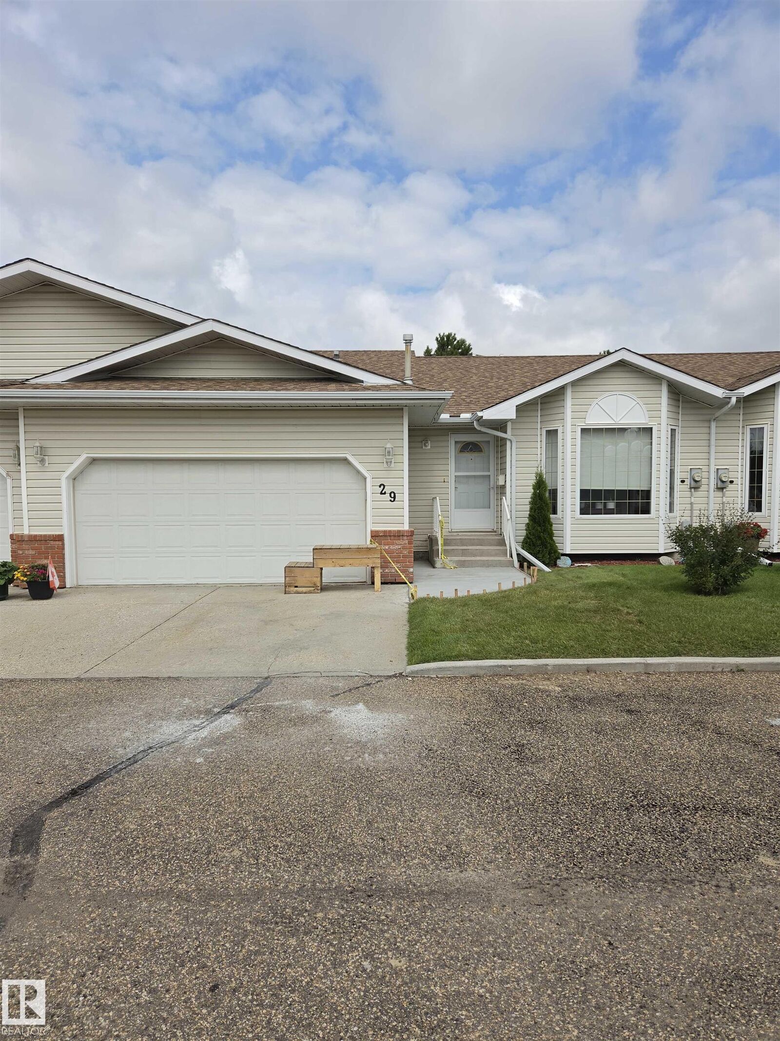 Property Photo: 7 Cranford Way 29 AB T8H 5W5