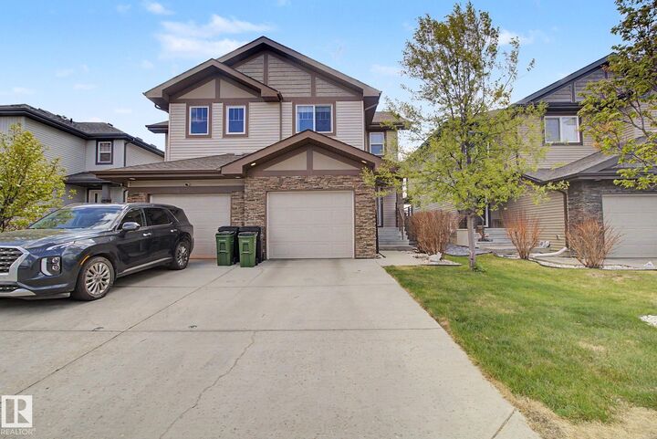 Property Photo:  7147 Cardinal Way SW  AB T6W 2Y3 